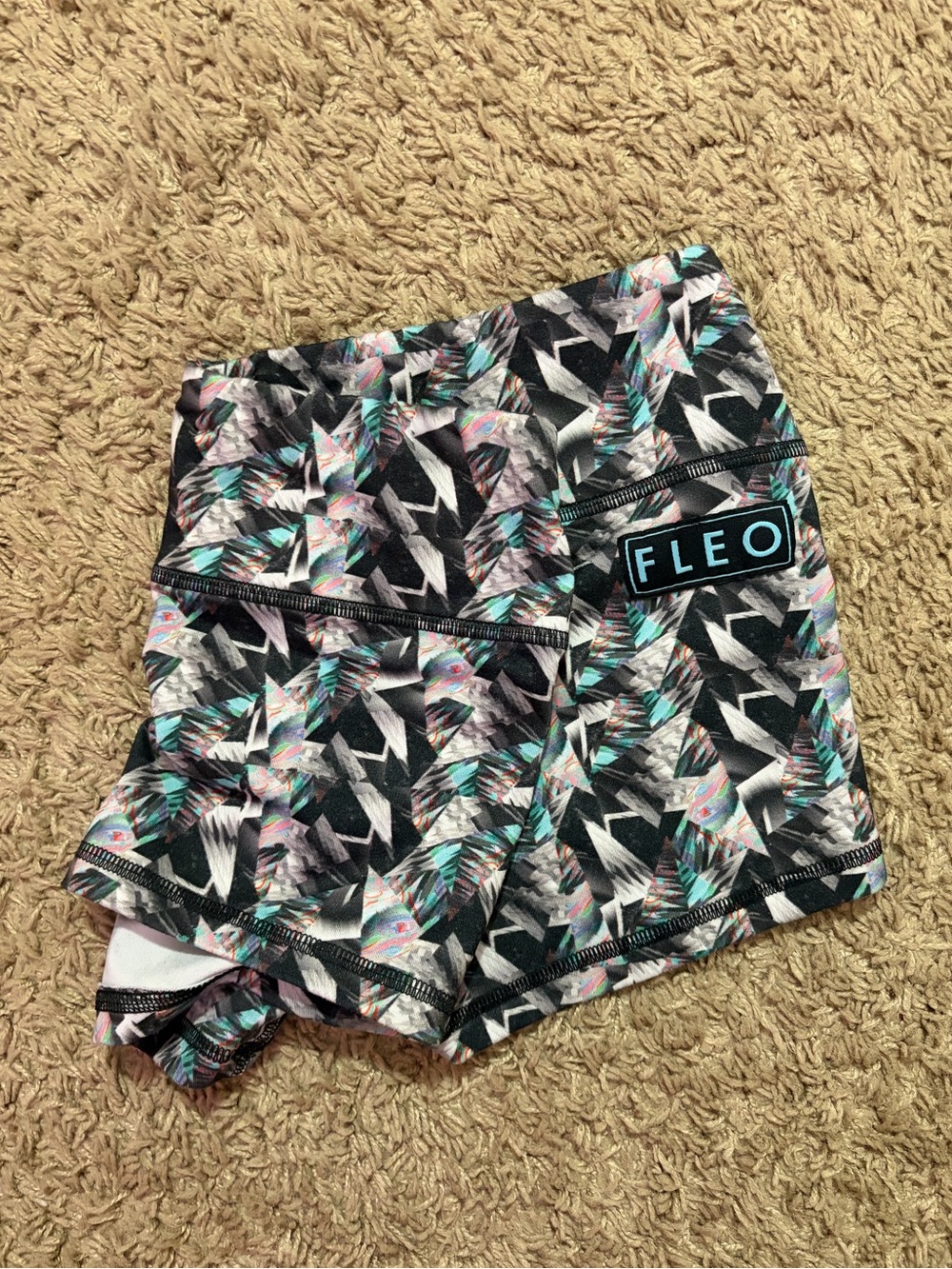 FLEO OG | Medium/Womens | Multicolored spandex athletic shorts.